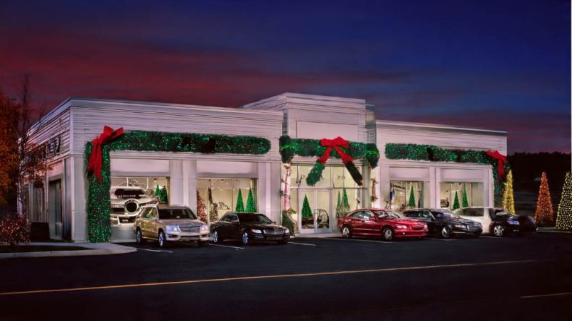 Dealer showroom exterior decorated for holiday sales event