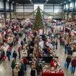 Aerial view of holiday shoppers browsing vendor booths at the Southern Christmas Show inside The Park Expo and Conference Center, Charlotte, NC